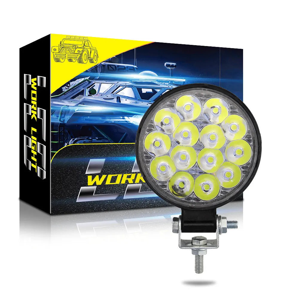 White mini round LED work light with aluminium housing for vehicle and machinery applications