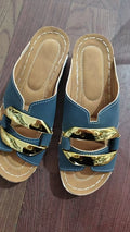 Pair of Roman-style platform flip-flop sandals on a solid colour background.
