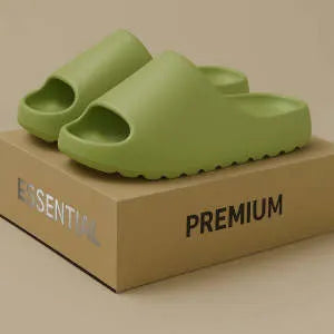 Women's thick-sole beach slippers in beige, shown on a sandy background.