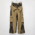 Dark khaki leopard print high waist tooling pants with fake two stitching detail on straight leg denim jeans