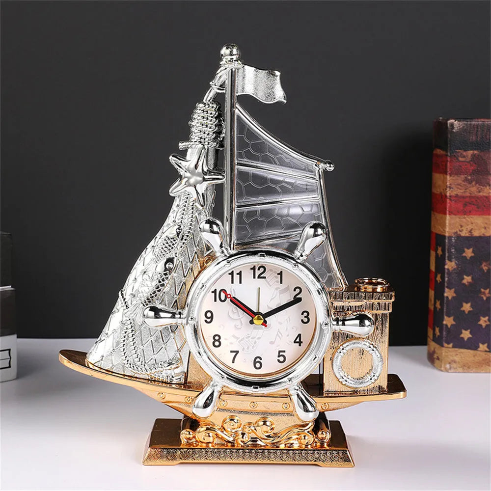 Creative plastic alarm clock in gold or silver finish for bedroom decor.