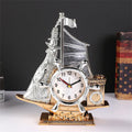 Creative plastic alarm clock in gold or silver finish for bedroom decor.