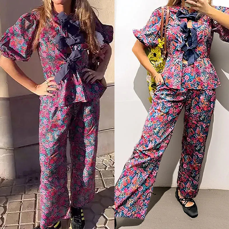 Leisure floral printed tie-neck trousers suit with puff sleeves, shown in picture colour.