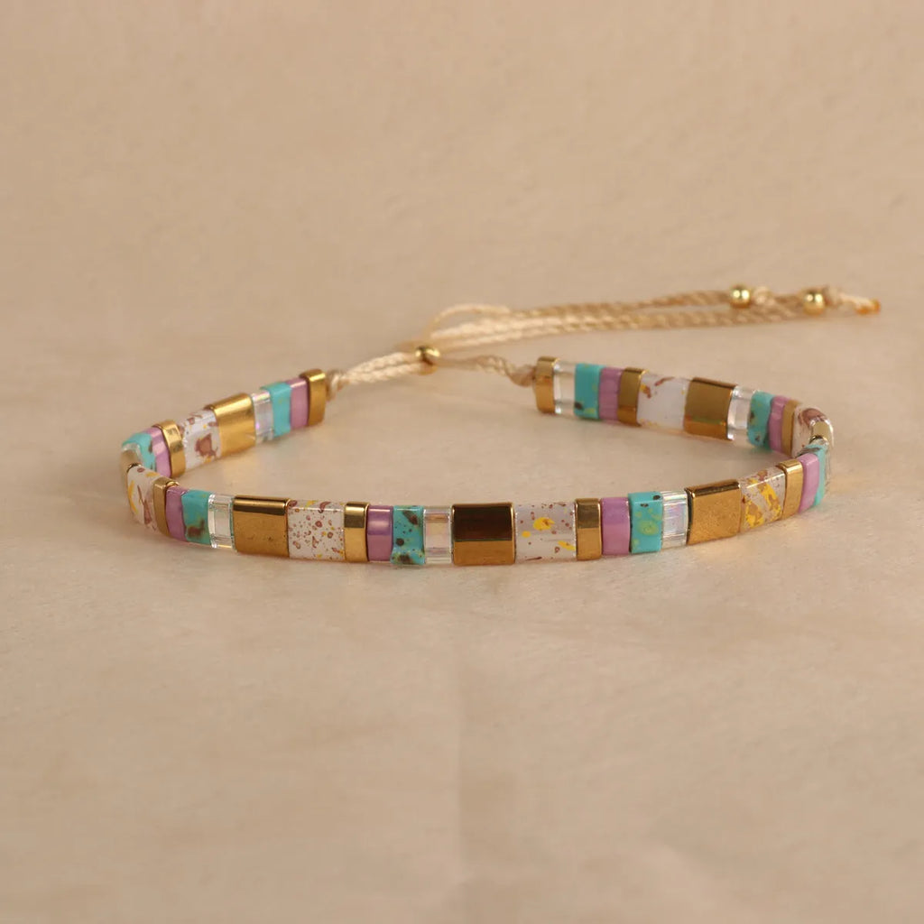Geometric pull bead glass bracelet in multiple colour options on wrist