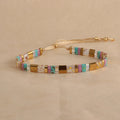 Geometric pull bead glass bracelet in multiple colour options on wrist
