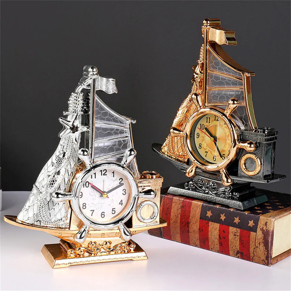 Creative plastic alarm clock in gold or silver finish for bedroom decor.