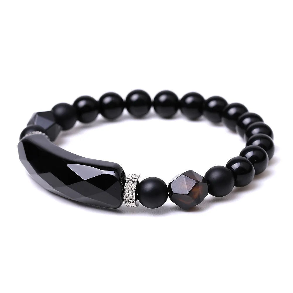 Handmade diamond-shaped cut black agate bracelet with geometric design and fan-shaped elements