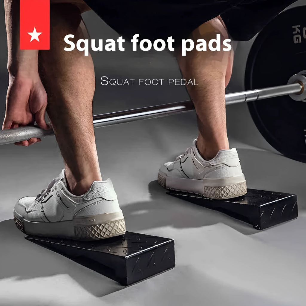 Black iron squat foot pad hard pull auxiliary force generator on gym floor