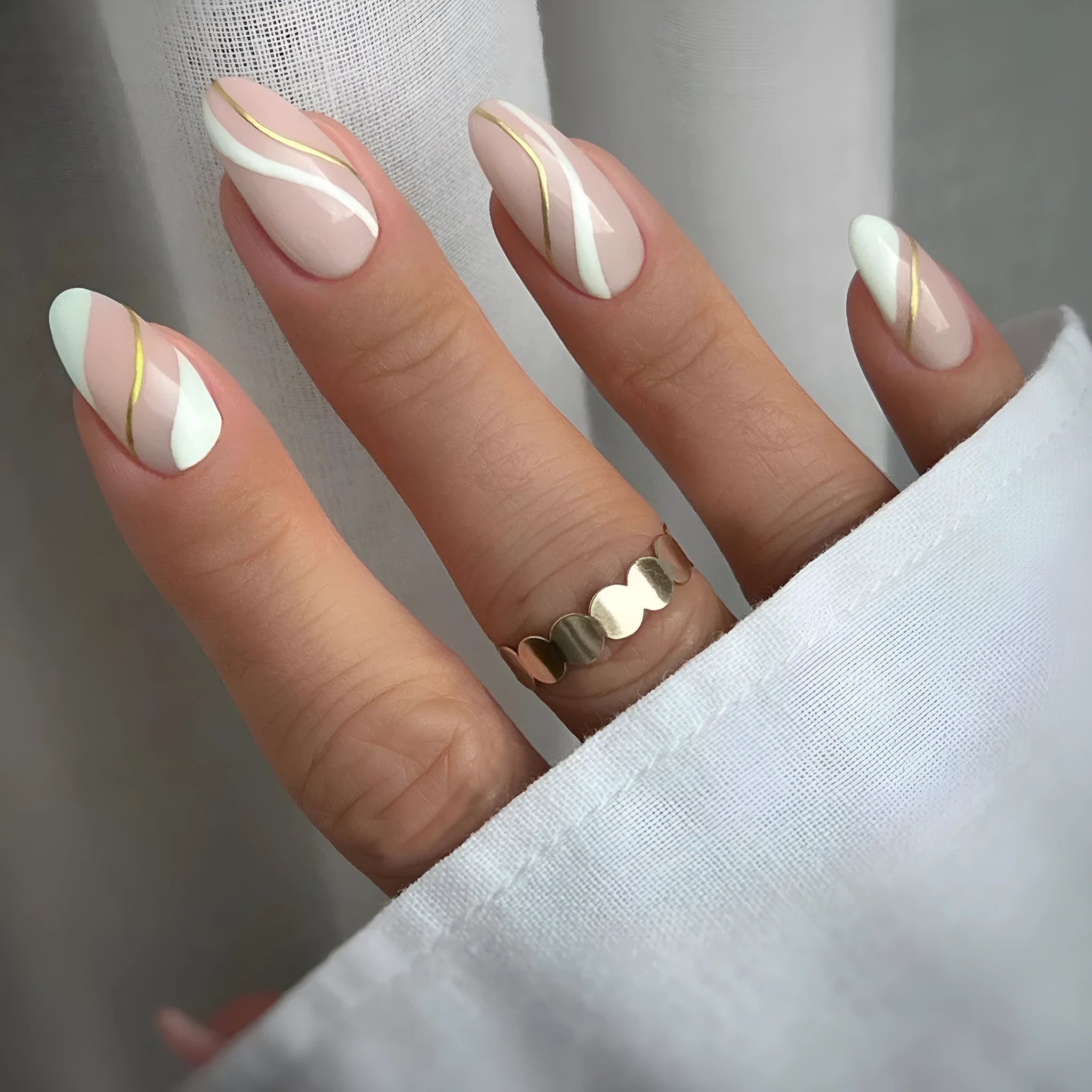 Wearable nail stickers with plaid pattern in medium drop shape, includes plastic application armour