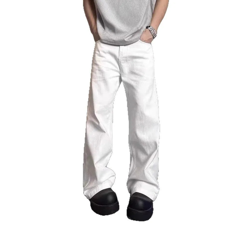 Men's white denim jeans with loose straight wide leg cut and mid waist