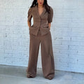 Brown slim fit waist formal suit set with jacket and trousers on hanger