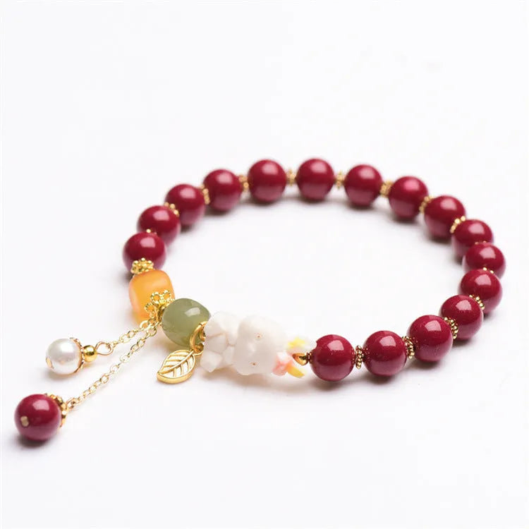 Traditional Chinese cinnabar bracelet with rabbit charm in 8mm or 10mm bead sizes