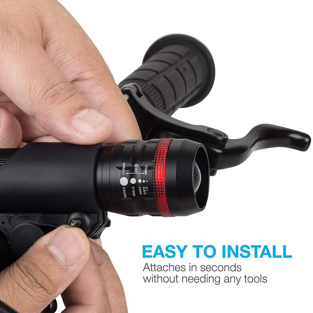 Bicycle headlight and taillight set with a black mounting bracket on a bike handlebar