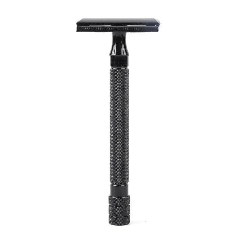 Traditional manual shaving razor with brush set on a black or silver handle