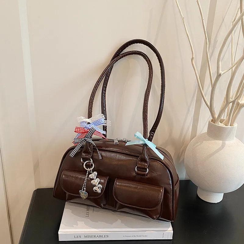 Women's retro pillow-shaped handbag in PU leather with double shoulder straps