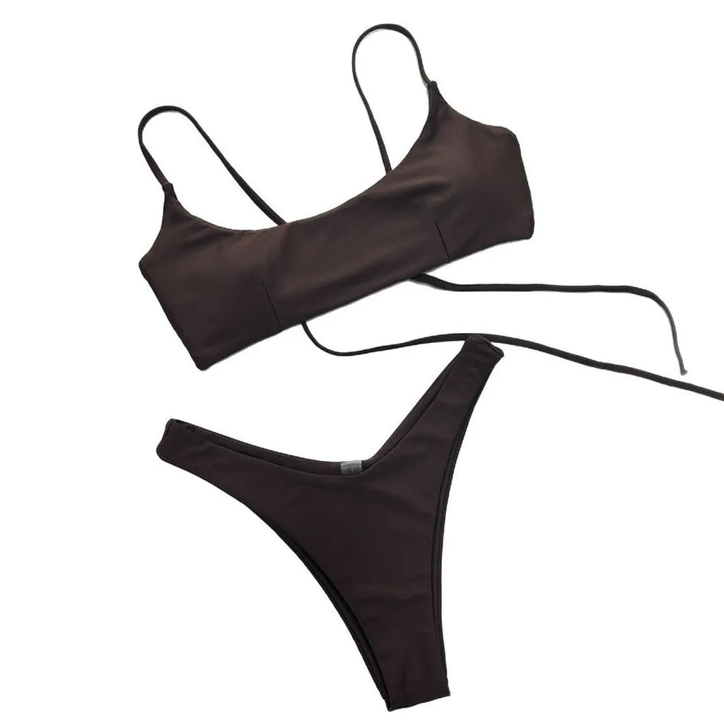 Solid colour split women's swimsuit in nylon, sleeveless one-piece, available in brown, beige, and black
