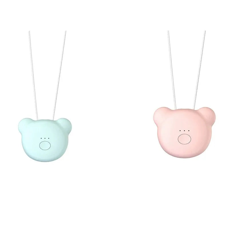 Mini USB air purifier pendant on a necklace, shown in pink colour with charging cable.