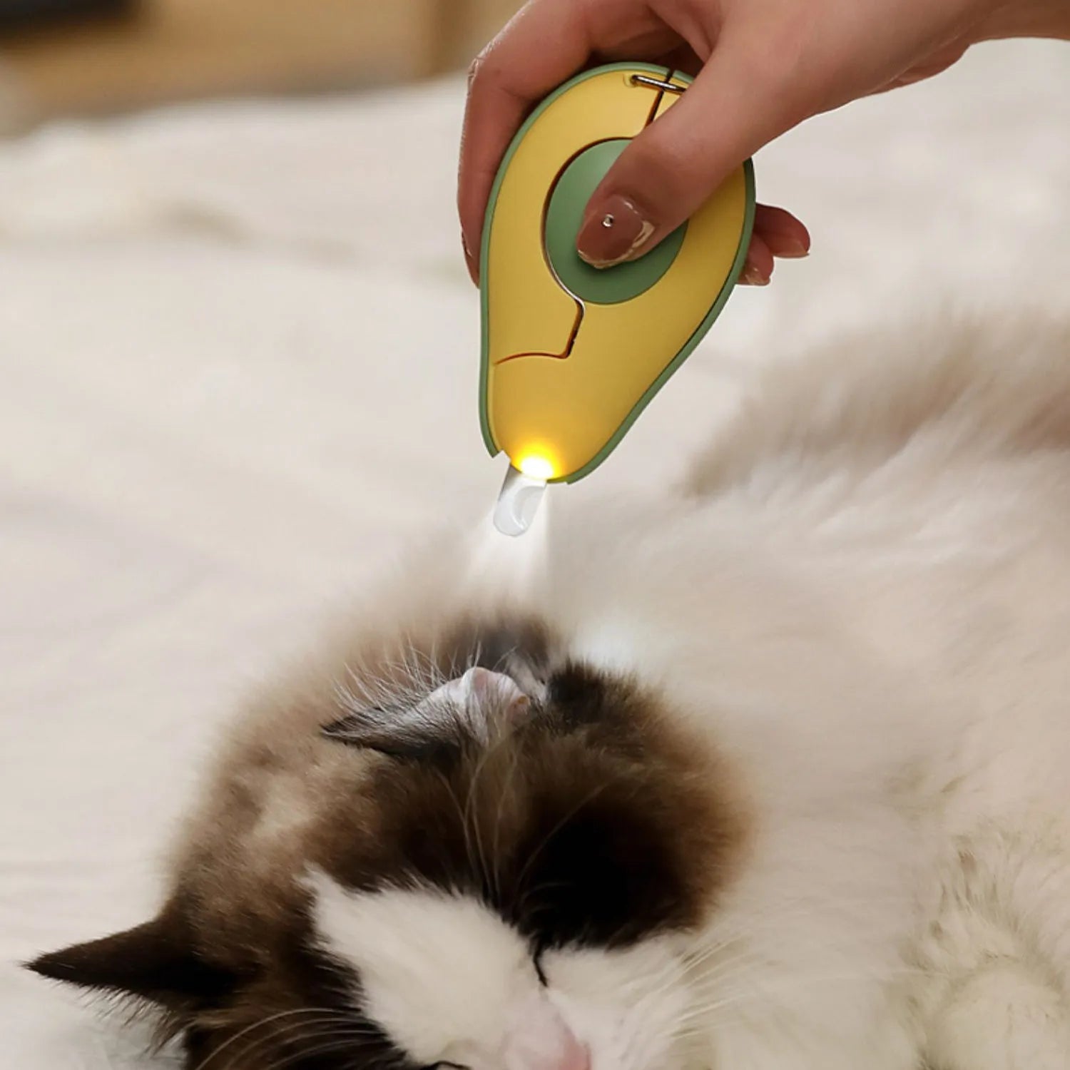 Professional LED light pet nail clipper for small dogs and cats in green, pink, or white.