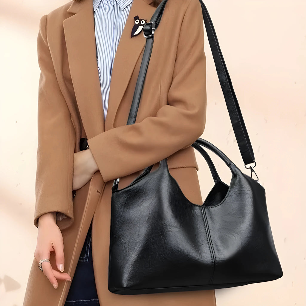 Women's soft genuine leather cross-body bag in one of seven colours with large capacity.