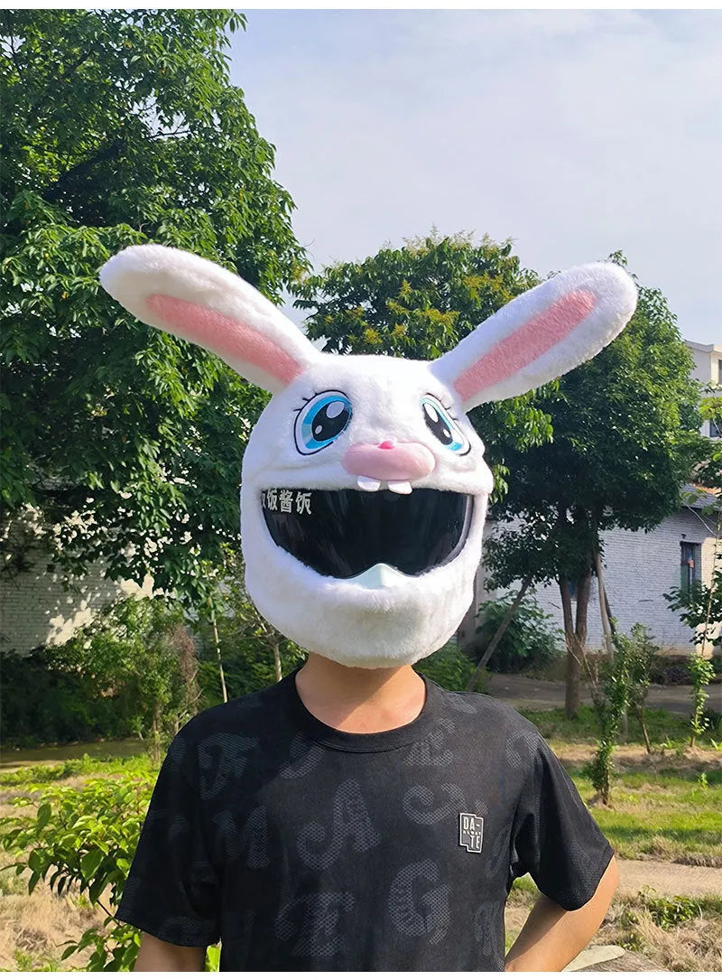 Long eared white rabbit plush cover on an electric motorcycle helmet.