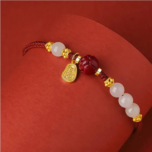 Hetian Jade Cinnabar Red Rope Women's Bracelet made of 925 silver with an adjustable chain.