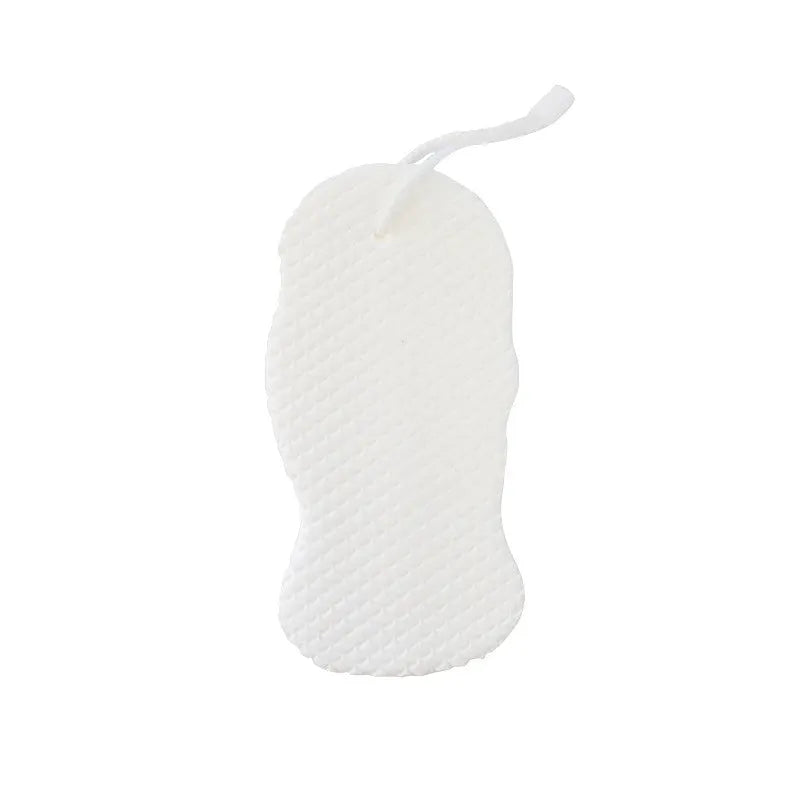 3D white bath sponge with fish scale pattern for gentle body exfoliation.
