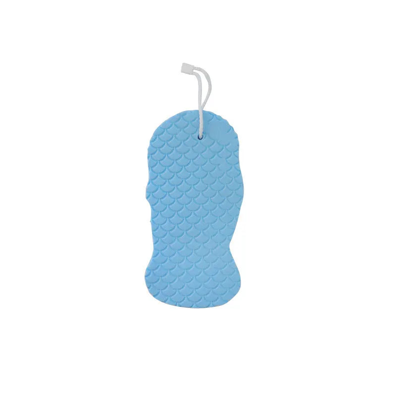 3D white bath sponge with fish scale pattern for gentle body exfoliation.