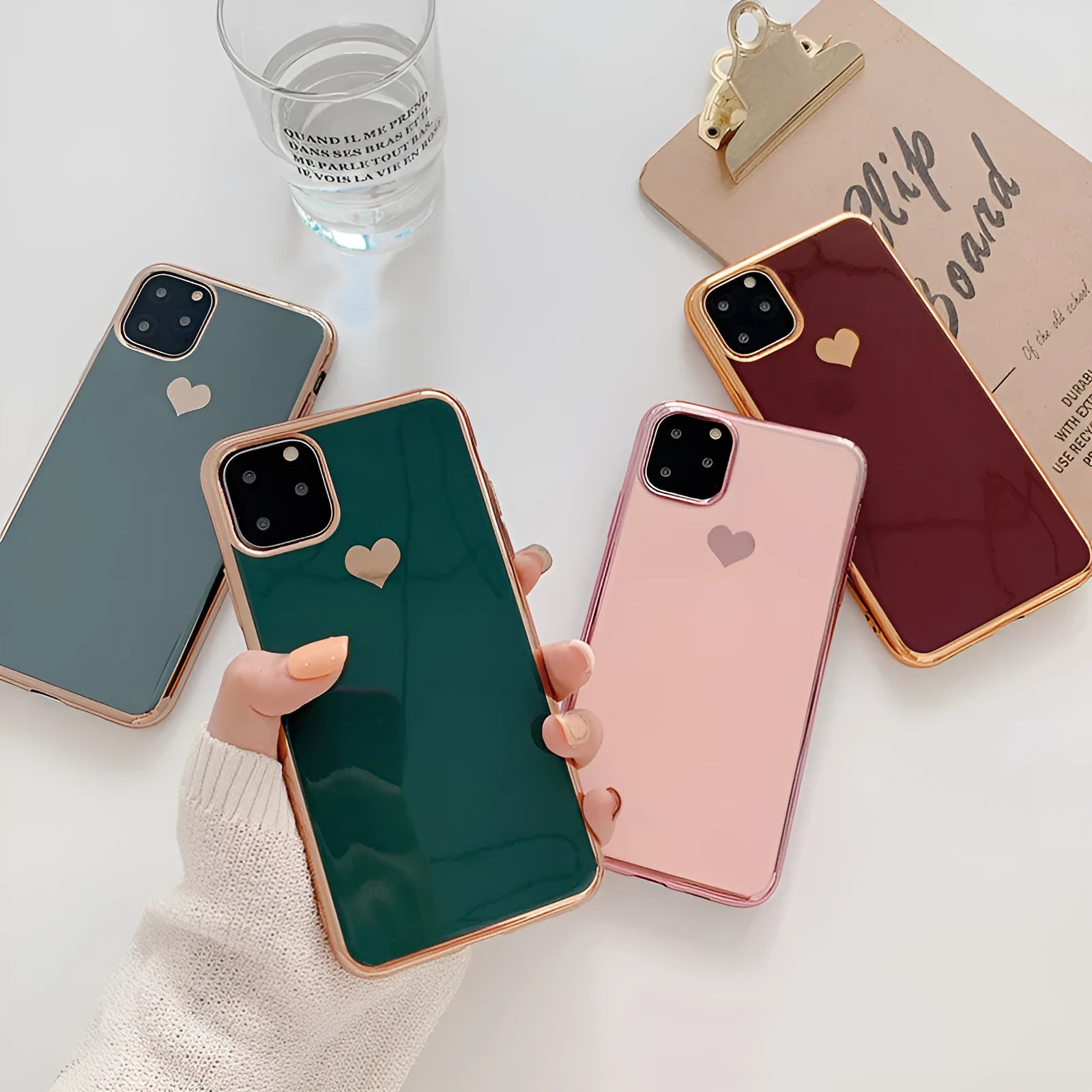 Solid colour TPU smartphone back cover case for iPhone models on a plain background.