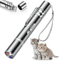 Silver aluminium cat laser pointer toy showing light patterns on a wall.