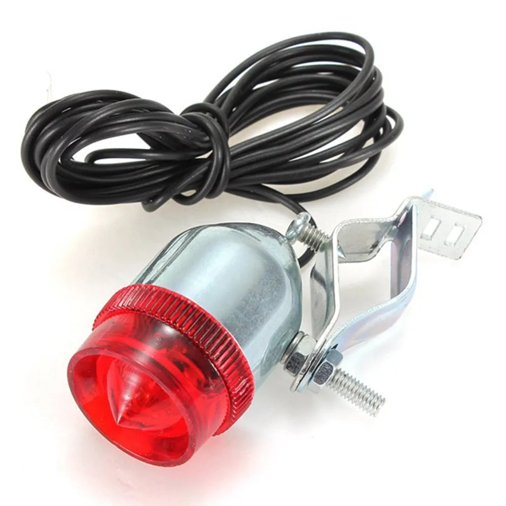 Silver bicycle dynamo-powered generator light set for front and rear bike lighting.