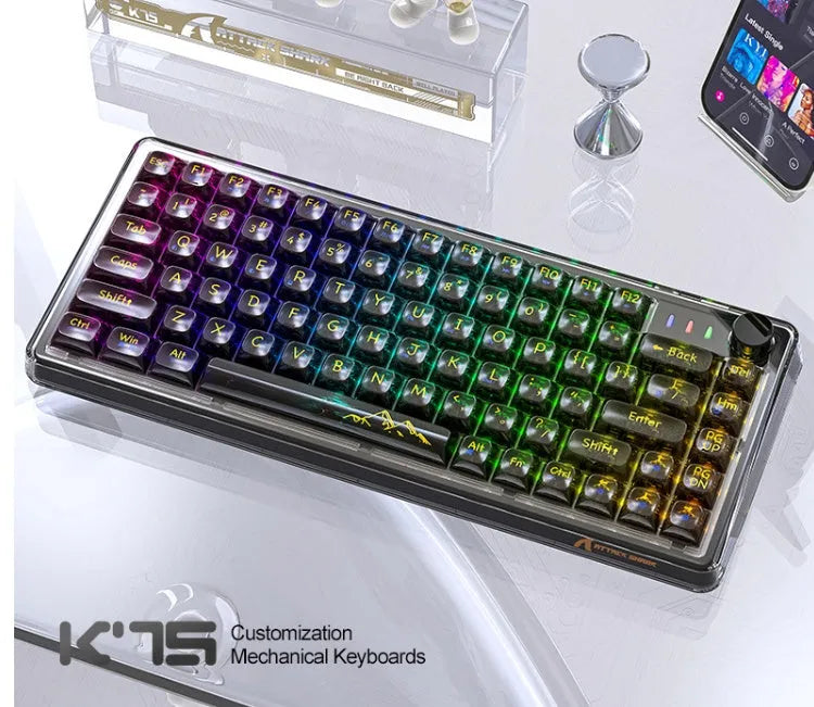Attack Shark K75 transparent wireless mechanical keyboard with RGB backlighting on a desk
