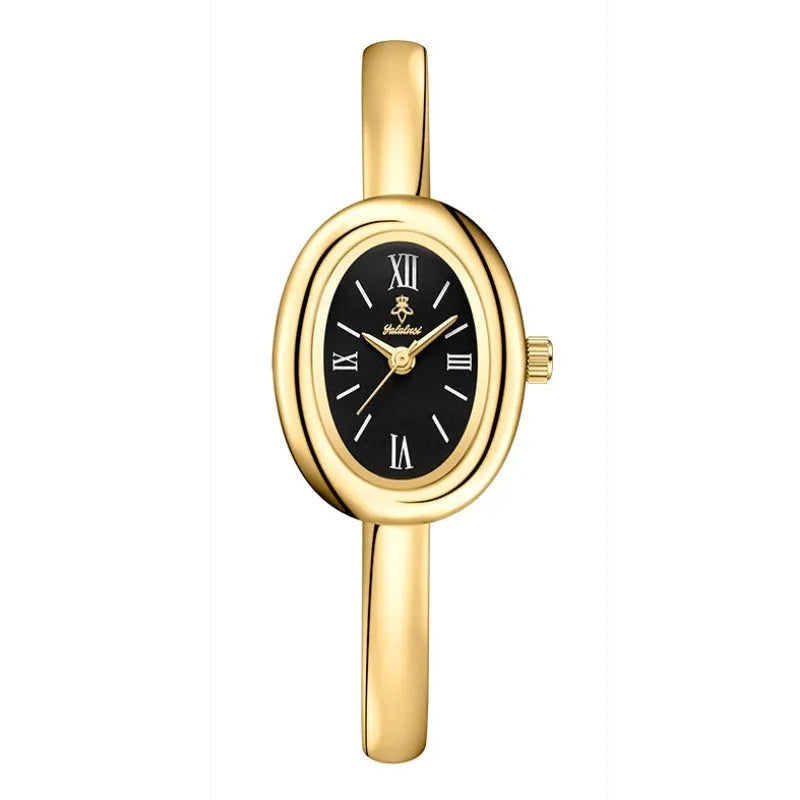 Women's oval-faced retro quartz watch in gold colour with slim 8mm profile