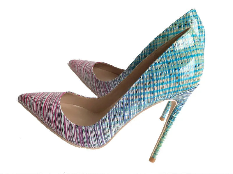 Pink to blue gradient patent leather ladies pointed toe high heels on a plain background