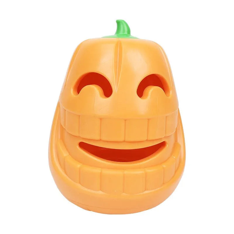 Orange Halloween pumpkin shaped rubber dog toy with a hollow centre for treats.