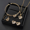 Gold alloy jewellery set with love, water drop and bell charms including earrings, pendant and bracelet