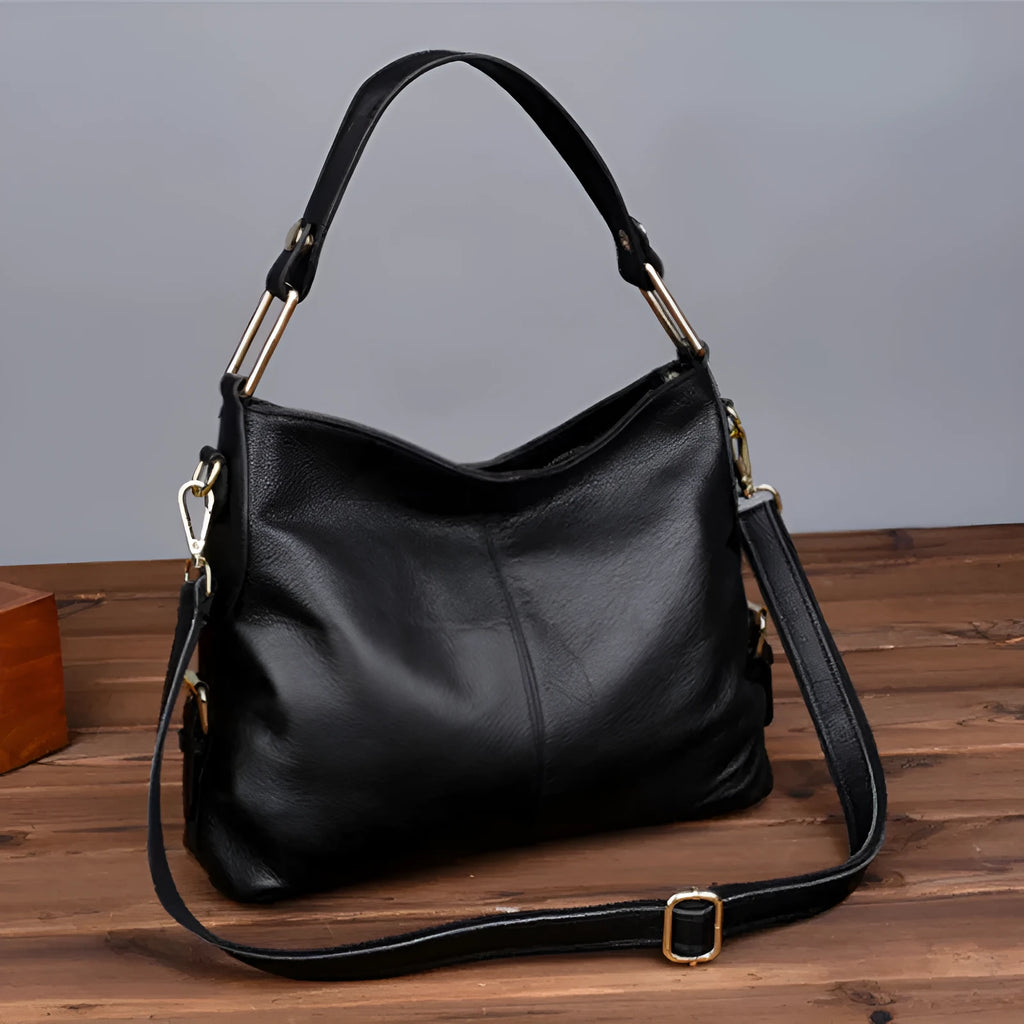 Genuine leather crossbody bag in vertical square shape with multiple compartments and sandwich pocket