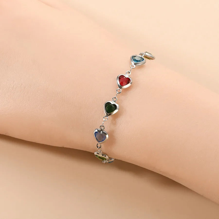 Devil's Eye creative heart stainless steel bracelet in colourful, royal blue, dark green, red, light green, and light blue options