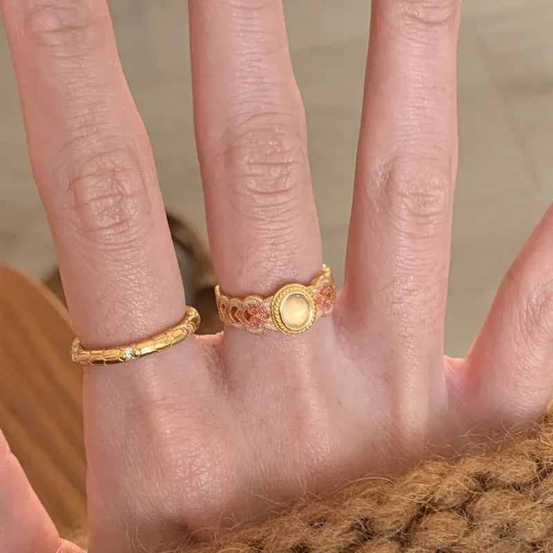 Pink crystal enamel geometric open ring on gold-plated copper band with adjustable cuff design