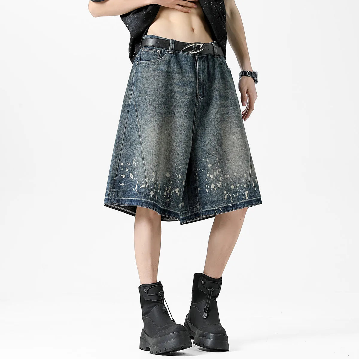 Men's retro blue denim shorts with ripped detailing and splash ink patterns in straight cut design