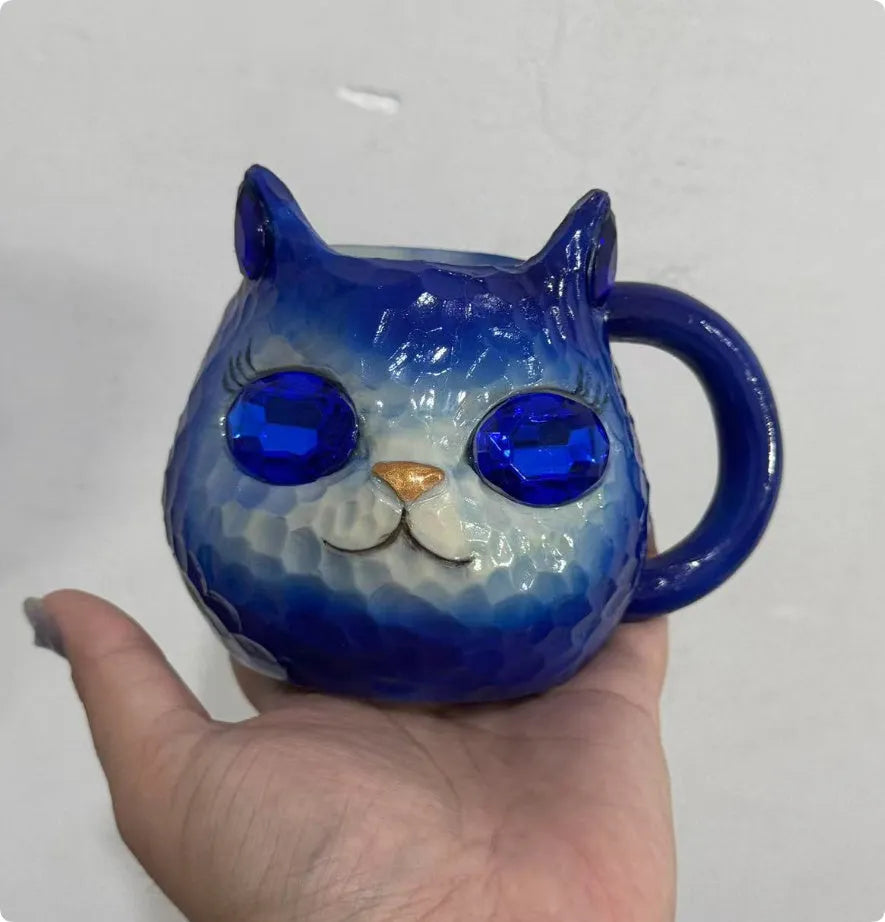 Resin cat cup gift with crystal Earth globe in blue, green, pink, or purple colour options.