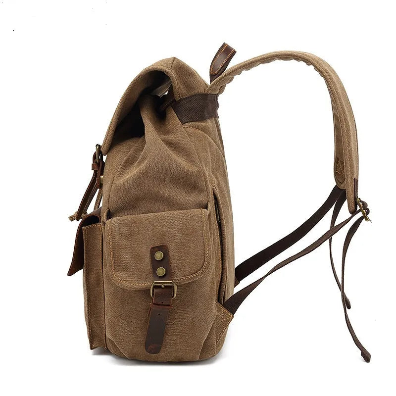 Retro canvas backpack in army green with antique bronze hardware and 16-inch laptop compartment