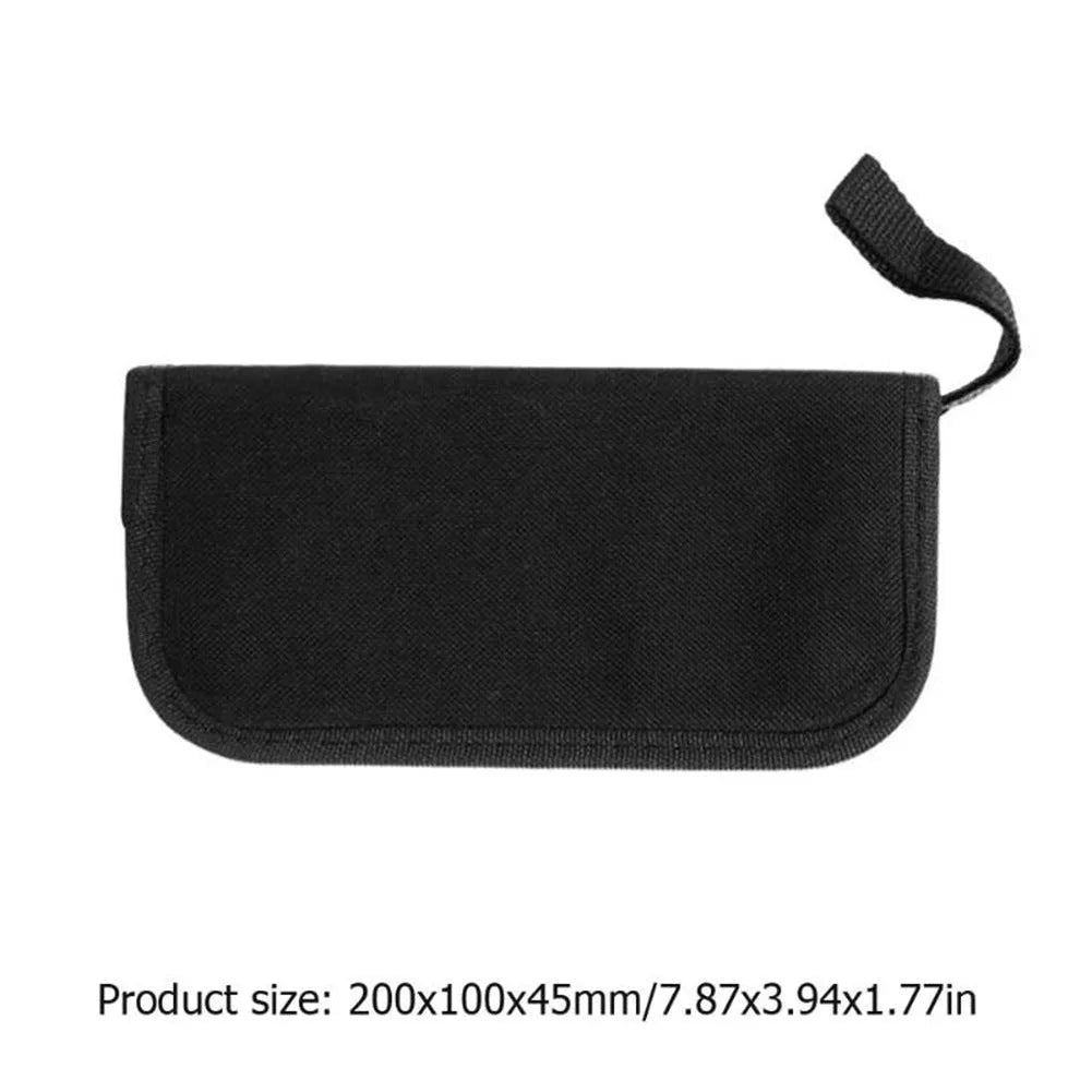 Black plastic case of guitar repair tool kit with metal components for instrument maintenance.