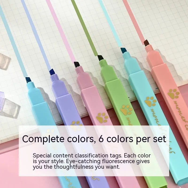 Box of six Cat's Paw fluorescent marking pens with oblique nibs, shown in assorted colours.