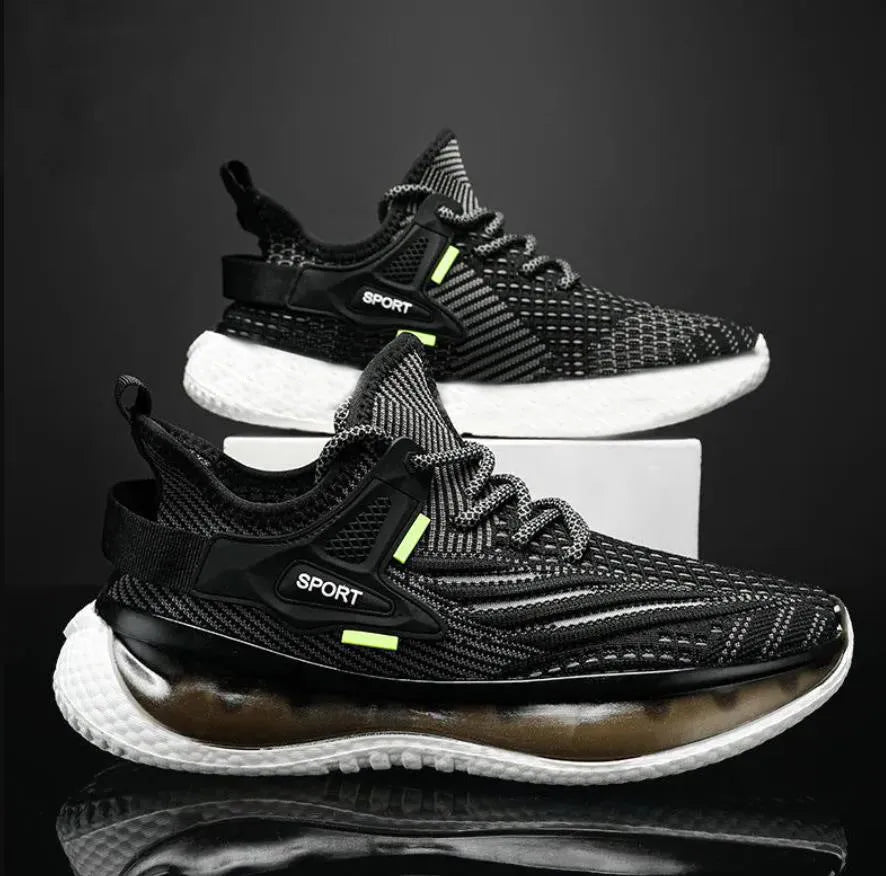 Men's low-top casual sneaker in woven mesh with flat rubber sole and front lace-up closure.