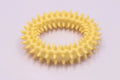 Blue spiky TPR ring dog chew toy for dental cleaning on a white background