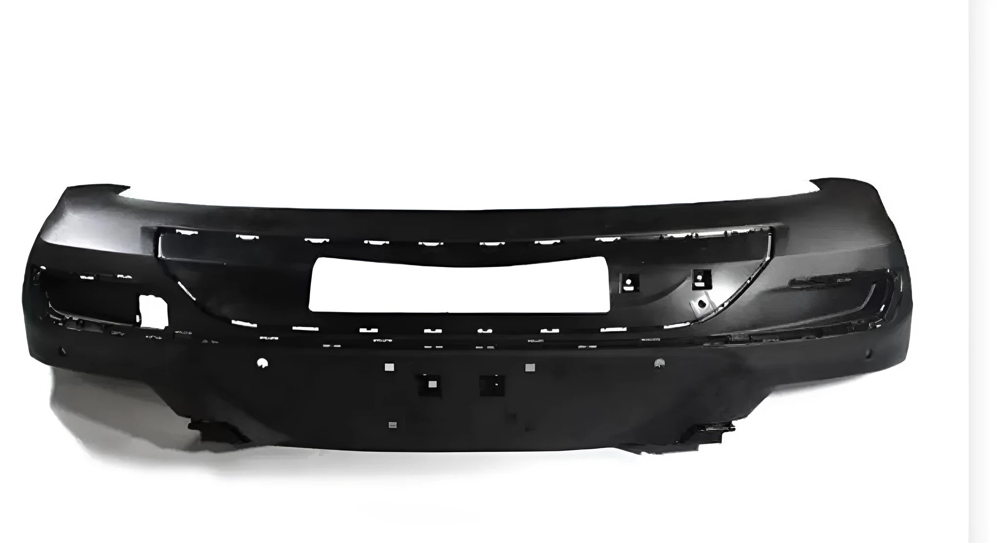 Black plastic car front bumper replacement part on white background
