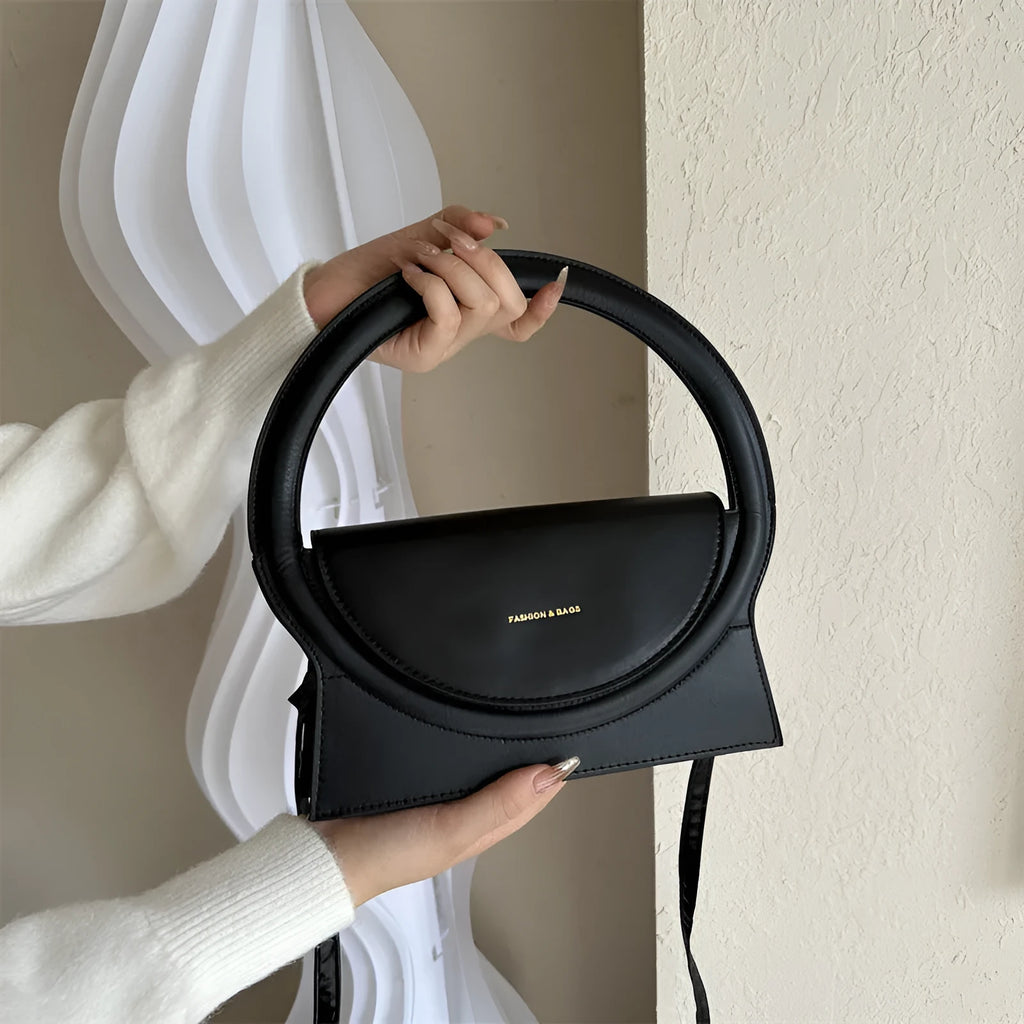 PU leather messenger bag with sandwich pockets and visible stitching in multiple colour options