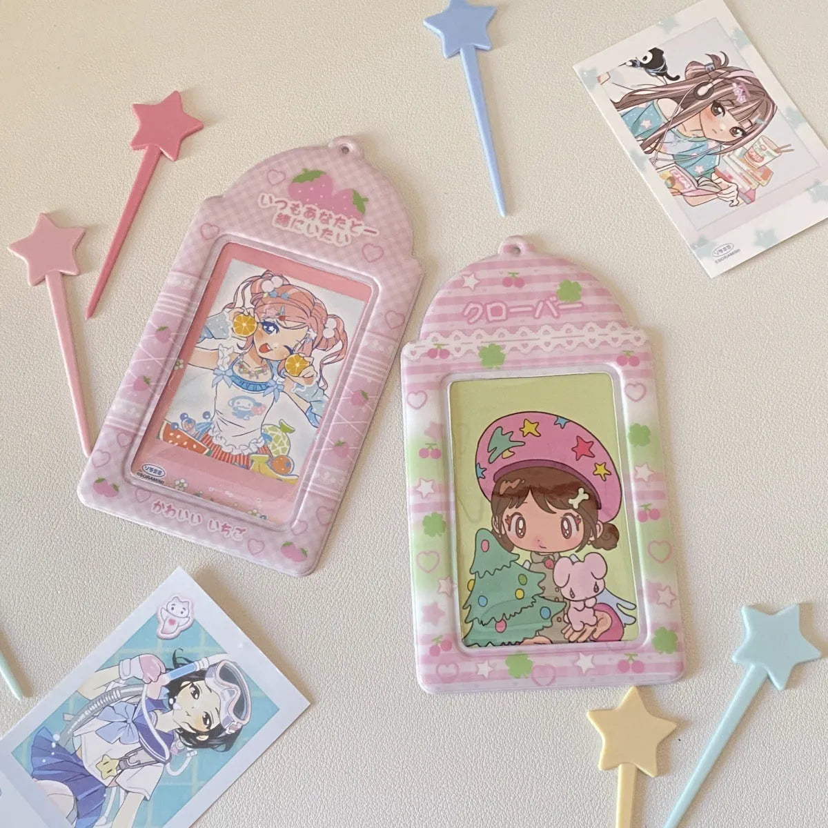 Cartoon strawberry or four-leaf clover PVC card holder measuring 7.6 by 13.6 centimetres.