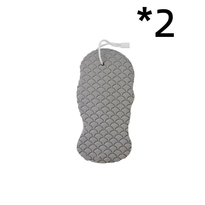 3D white bath sponge with fish scale pattern for gentle body exfoliation.