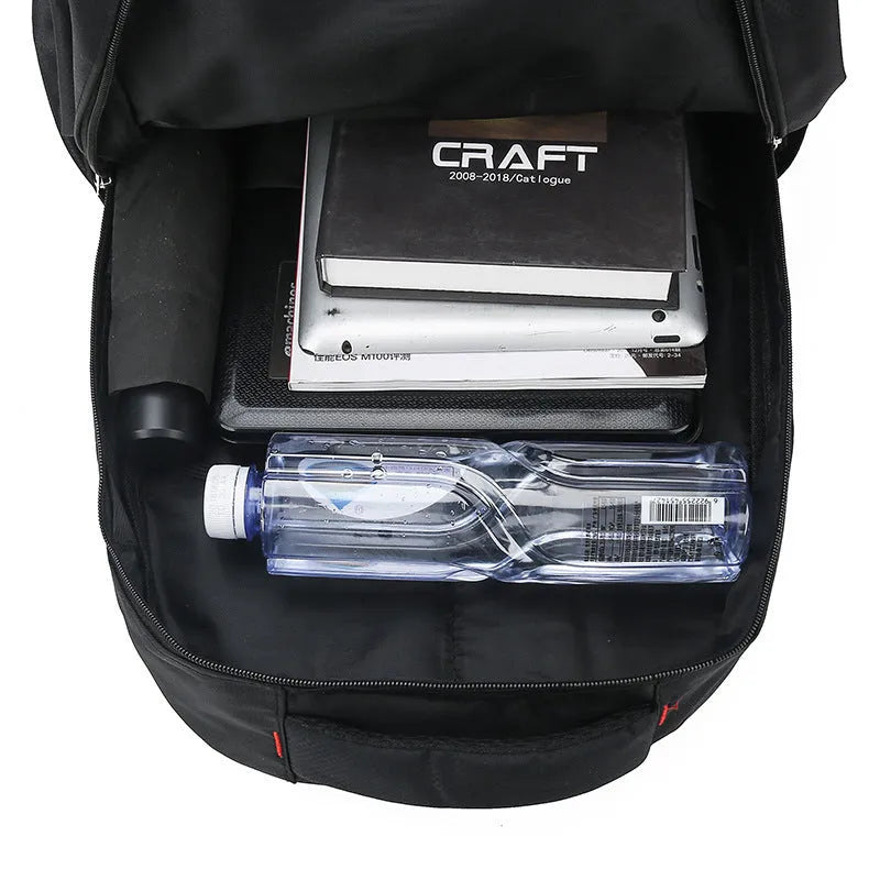Breathable nylon backpack for men with 20-35L capacity, curved shoulder strap, and letter design in gray